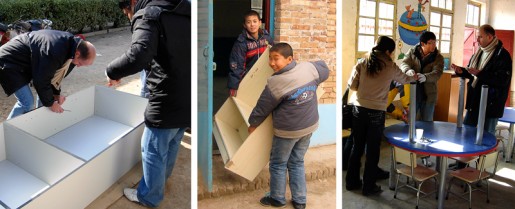 Fuli Cement’s Managing Director Pierre Eloy working with factory  staff and students to assemble library shelves and tables